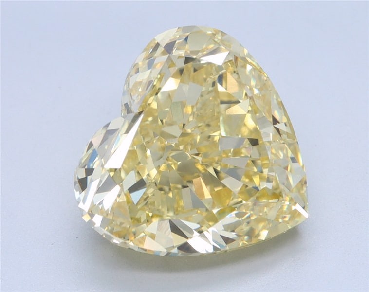Loose Diamond - HEART 9.03ct YELLOW VS1: Loose Diamond - HEART 9.03ct YELLOW VS1 Source: This is a real non-mined Diamond that has been grown in a lab Shape: HEART Carats: 9.03 Color: YELLOW Clarity: VS1 Certification: IGI Condition: Pre-Own