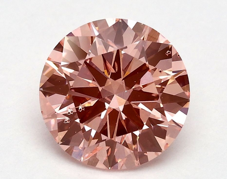 Loose Diamond - ROUND 1.5ct Fancy Vivid Pink SI2: Loose Diamond - ROUND 1.5ct Fancy Vivid Pink SI2 Source: This is a real non-mined Diamond that has been grown in a lab Shape: ROUND Carats: 1.5 Color: Fancy Vivid Pink Certification: IGI Video: