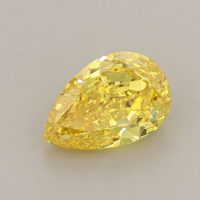 Loose Diamond - PEAR 0.64ct Fancy Vivid Yellow VS1: Loose Diamond - PEAR 0.64ct Fancy Vivid Yellow VS1 Source: This is a real non-mined Diamond that has been grown in a lab Shape: PEAR Carats: 0.64 Color: Fancy Vivid Yellow Certification: IGI Video: