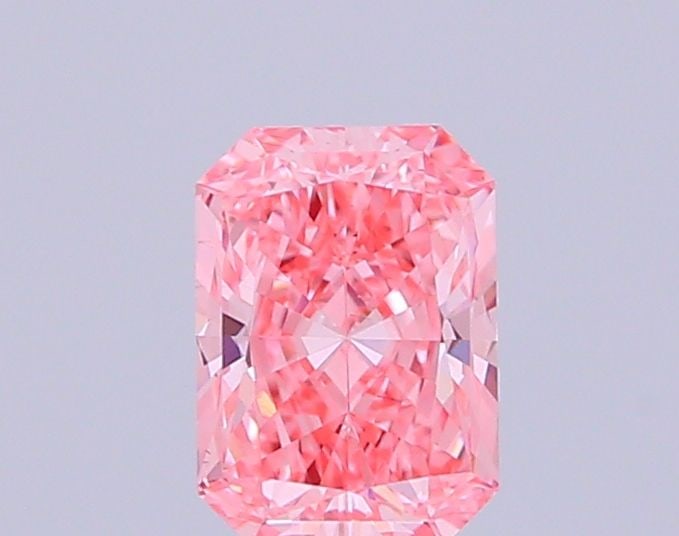 Loose Diamond - RADIANT 0.91ct Fancy Vivid Pink VS1: Loose Diamond - RADIANT 0.91ct Fancy Vivid Pink VS1 Source: This is a real non-mined Diamond that has been grown in a lab Shape: RADIANT Carats: 0.91 Color: Fancy Vivid Pink Certification: IGI Video: