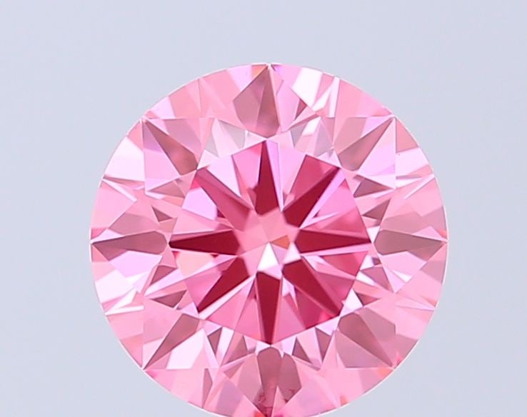 Ideal Loose Diamond - ROUND 1.41ct Fancy Vivid Pink VVS2: Ideal Loose Diamond - ROUND 1.41ct Fancy Vivid Pink VVS2 Source: This is a real non-mined Diamond that has been grown in a lab Shape: ROUND Carats: 1.41 Color: Fancy Vivid Pink Certification: IGI Vide