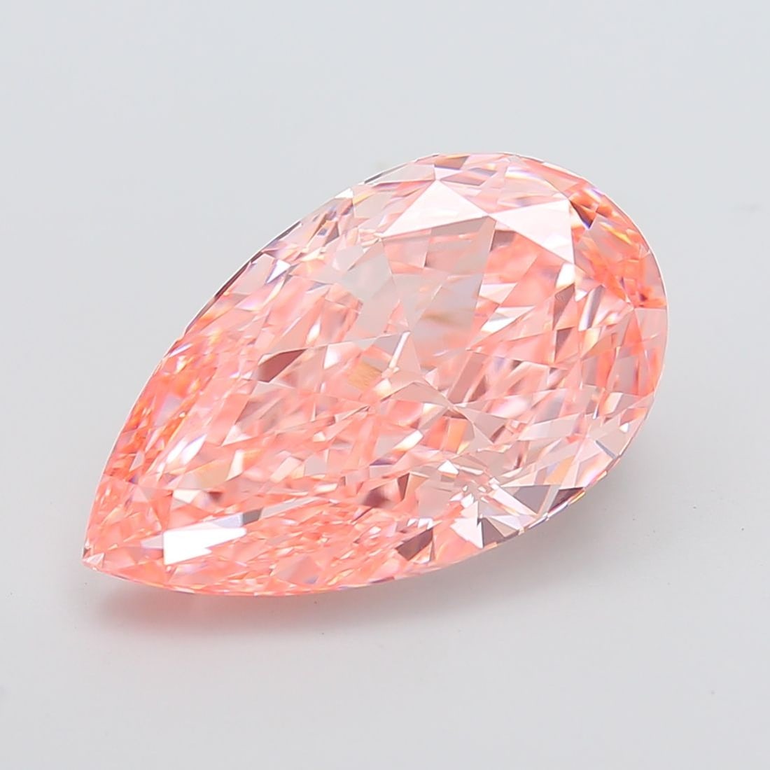 Loose Diamond - PEAR 11.57ct Fancy Vivid Pink VVS2: Loose Diamond - PEAR 11.57ct Fancy Vivid Pink VVS2 Source: This is a real non-mined Diamond that has been grown in a lab Shape: PEAR Carats: 11.57 Color: Fancy Vivid Pink Certification: IGI Video:
