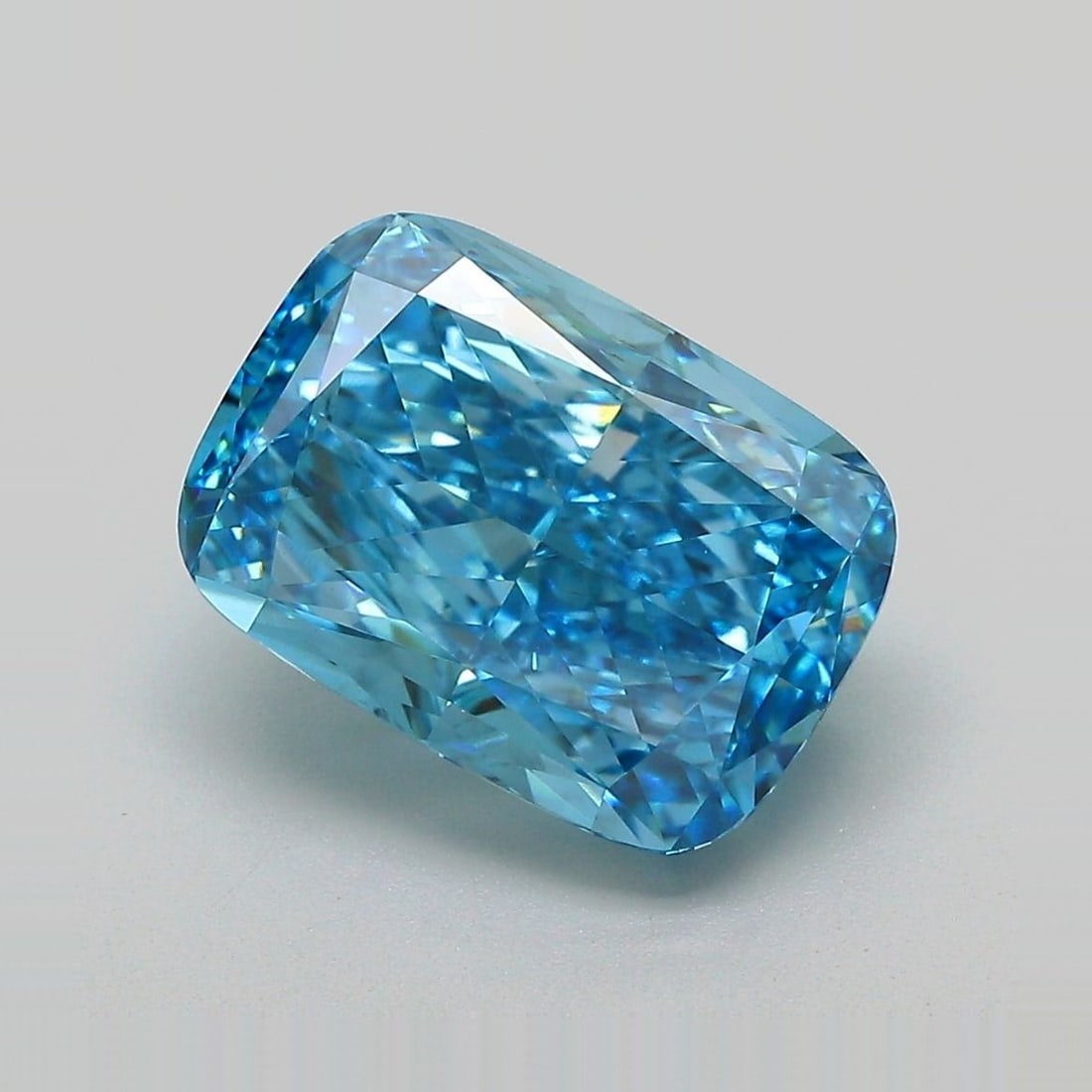 Loose Diamond - CUSHION MODIFIED 5.38ct Fancy Vivid Blue VS2: Loose Diamond - CUSHION MODIFIED 5.38ct Fancy Vivid Blue VS2 Source: This is a real non-mined Diamond that has been grown in a lab Shape: CUSHION MODIFIED Carats: 5.38 Color: Fancy Vivid Blue Certific