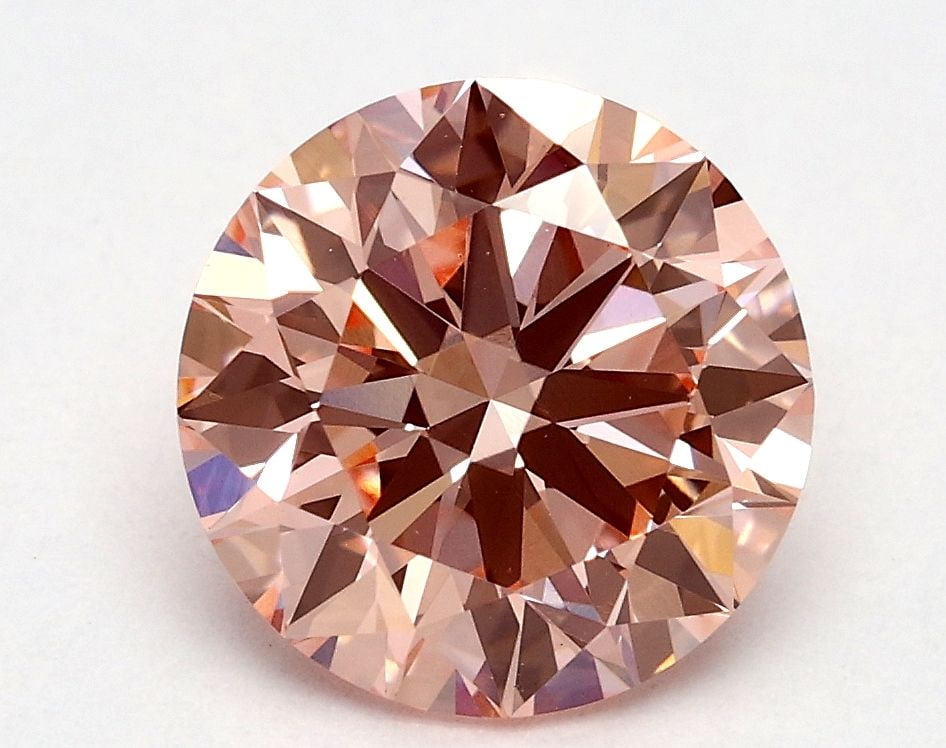 Loose Diamond - ROUND 1.74ct Fancy Vivid Pink VS1: Loose Diamond - ROUND 1.74ct Fancy Vivid Pink VS1 Source: This is a real non-mined Diamond that has been grown in a lab Shape: ROUND Carats: 1.74 Color: Fancy Vivid Pink Certification: IGI Video: