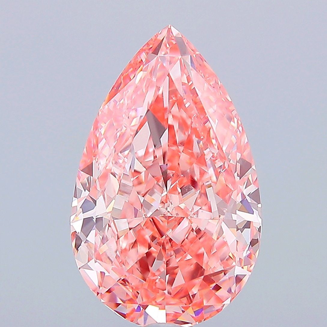 Loose Diamond - PEAR 10.01ct Fancy Vivid Pink VVS2: Loose Diamond - PEAR 10.01ct Fancy Vivid Pink VVS2 Source: This is a real non-mined Diamond that has been grown in a lab Shape: PEAR Carats: 10.01 Color: Fancy Vivid Pink Certification: IGI Video: