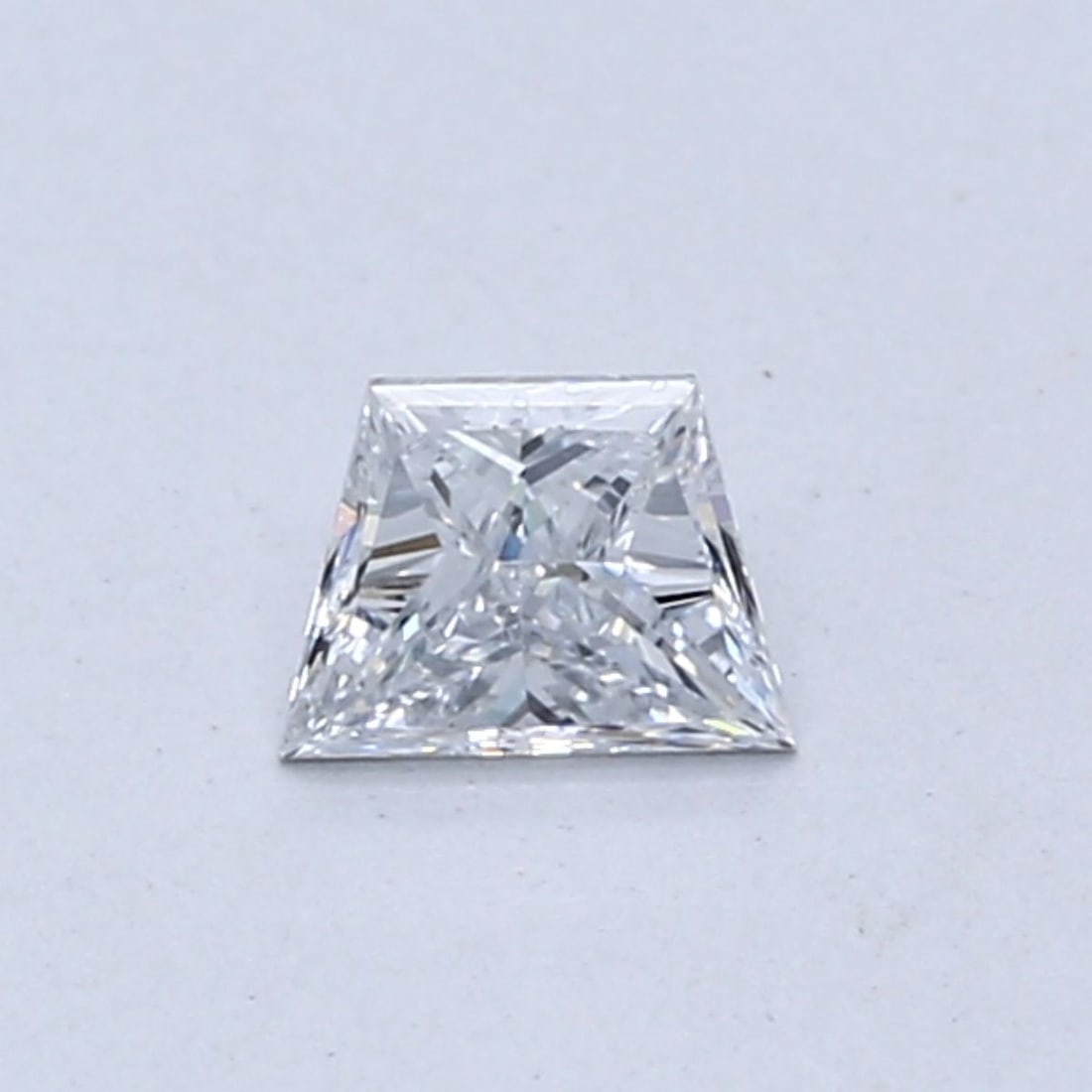 Loose Diamond - TRAPEZOID 0.3ct Light Blue VVS2: Loose Diamond - TRAPEZOID 0.3ct Light Blue VVS2 Source: This is a real non-mined Diamond that has been grown in a lab Shape: TRAPEZOID Carats: 0.3 Color: Light Blue Certification: NONE Video: Video