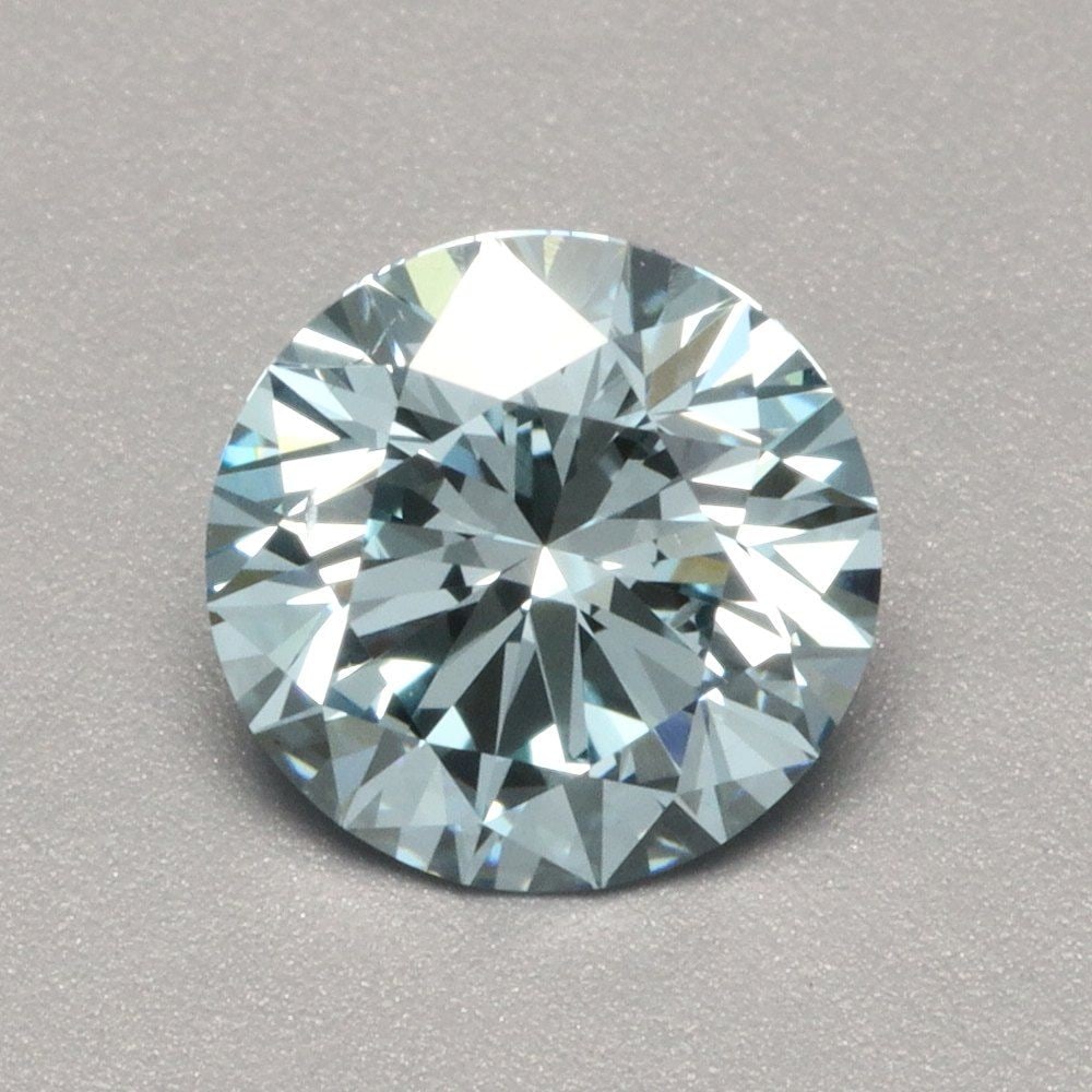 Loose Diamond - ROUND 1.0ct Fancy Vivid Blue VS2: Loose Diamond - ROUND 1.0ct Fancy Vivid Blue VS2 Source: This is a real non-mined Diamond that has been grown in a lab Shape: ROUND Carats: 1.0 Color: Fancy Vivid Blue Certification: IGI Video: