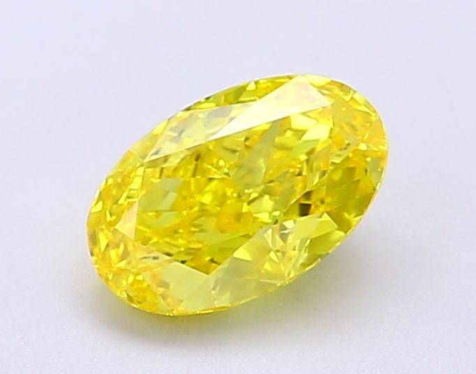 Loose Diamond - OVAL 1.12ct Fancy Vivid Yellow VS2: Loose Diamond - OVAL 1.12ct Fancy Vivid Yellow VS2 Source: This is a real non-mined Diamond that has been grown in a lab Shape: OVAL Carats: 1.12 Color: Fancy Vivid Yellow Certification: IGI Video: