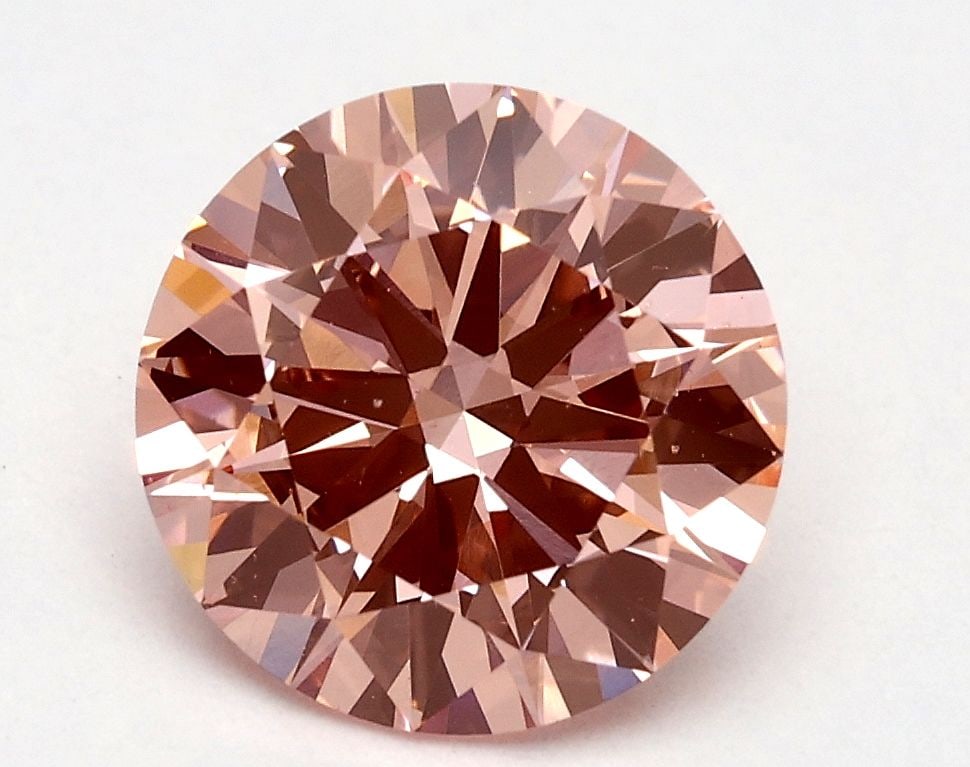 Loose Diamond - ROUND 1.71ct Fancy Vivid Pink VS2: Loose Diamond - ROUND 1.71ct Fancy Vivid Pink VS2 Source: This is a real non-mined Diamond that has been grown in a lab Shape: ROUND Carats: 1.71 Color: Fancy Vivid Pink Certification: IGI Video: