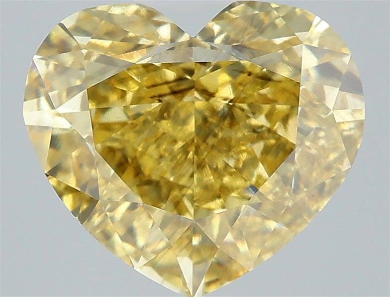 Loose Diamond - HEART 5.04ct Fancy Intense Yellow SI1: Loose Diamond - HEART 5.04ct Fancy Intense Yellow SI1 Source: This is a real non-mined Diamond that has been grown in a lab Shape: HEART Carats: 5.04 Color: Fancy Intense Yellow Certification: IGI Vid