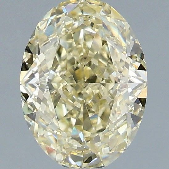Loose Diamond - OVAL 1.59ct Fancy Light Yellow VS1: Loose Diamond - OVAL 1.59ct Fancy Light Yellow VS1 Source: This is a real non-mined Diamond that has been grown in a lab Shape: OVAL Carats: 1.59 Color: Fancy Light Yellow Certification: IGI Video: