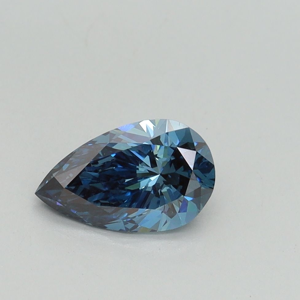 Loose Diamond - PEAR 0.74ct Fancy Vivid Blue VS1: Loose Diamond - PEAR 0.74ct Fancy Vivid Blue VS1 Source: This is a real non-mined Diamond that has been grown in a lab Shape: PEAR Carats: 0.74 Color: Fancy Vivid Blue Certification: IGI Video: