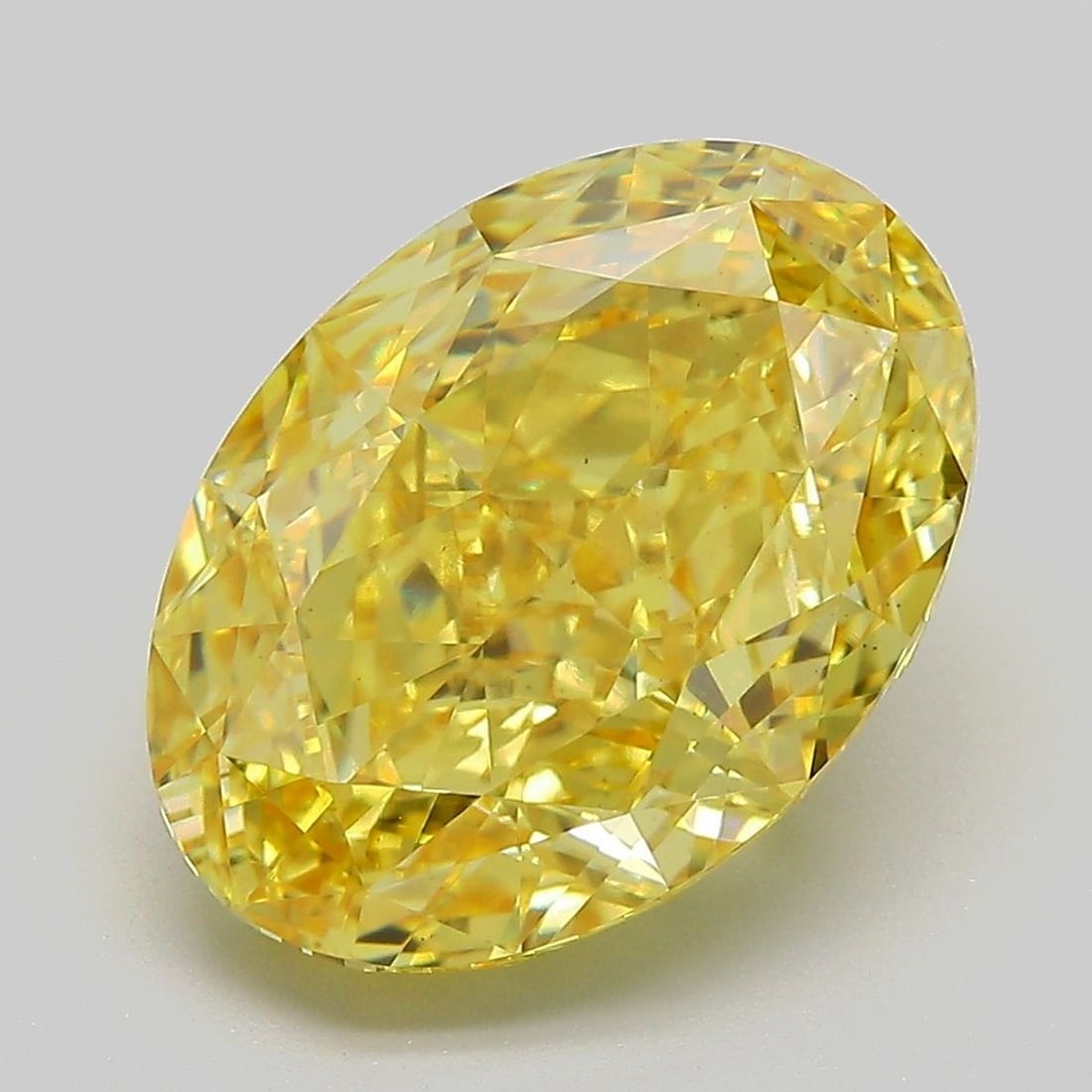 Loose Diamond - OVAL 6.47ct Fancy Vivid Yellow VS2: Loose Diamond - OVAL 6.47ct Fancy Vivid Yellow VS2 Source: This is a real non-mined Diamond that has been grown in a lab Shape: OVAL Carats: 6.47 Color: Fancy Vivid Yellow Certification: IGI Video: