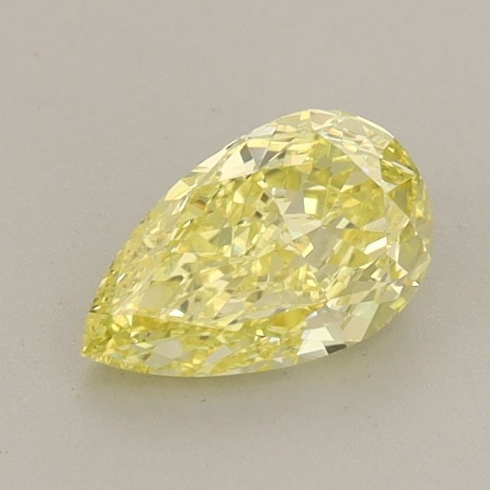 Loose Diamond - PEAR 0.71ct Fancy Vivid Yellow VS1: Loose Diamond - PEAR 0.71ct Fancy Vivid Yellow VS1 Source: This is a real non-mined Diamond that has been grown in a lab Shape: PEAR Carats: 0.71 Color: Fancy Vivid Yellow Certification: IGI Video: