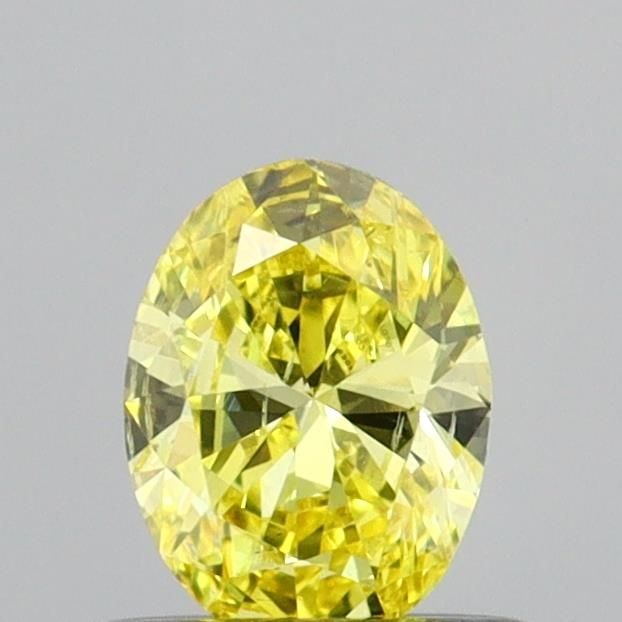 Loose Diamond - OVAL 0.43ct Fancy Vivid Yellow SI1: Loose Diamond - OVAL 0.43ct Fancy Vivid Yellow SI1 Source: This is a real non-mined Diamond that has been grown in a lab Shape: OVAL Carats: 0.43 Color: Fancy Vivid Yellow Certification: IGI Video: