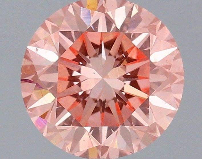 Loose Diamond - ROUND 1.67ct Fancy Vivid Pink VS1: Loose Diamond - ROUND 1.67ct Fancy Vivid Pink VS1 Source: This is a real non-mined Diamond that has been grown in a lab Shape: ROUND Carats: 1.67 Color: Fancy Vivid Pink Certification: IGI Video: