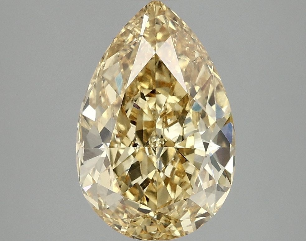 Loose Diamond - PEAR 2.97ct Fancy Vivid Yellow VS2: Loose Diamond - PEAR 2.97ct Fancy Vivid Yellow VS2 Source: This is a real non-mined Diamond that has been grown in a lab Shape: PEAR Carats: 2.97 Color: Fancy Vivid Yellow Certification: IGI Video: