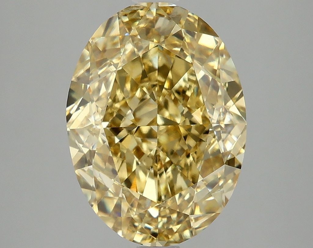 Loose Diamond - OVAL 5.09ct Fancy Vivid Yellow VS2: Loose Diamond - OVAL 5.09ct Fancy Vivid Yellow VS2 Source: This is a real non-mined Diamond that has been grown in a lab Shape: OVAL Carats: 5.09 Color: Fancy Vivid Yellow Certification: IGI Video: