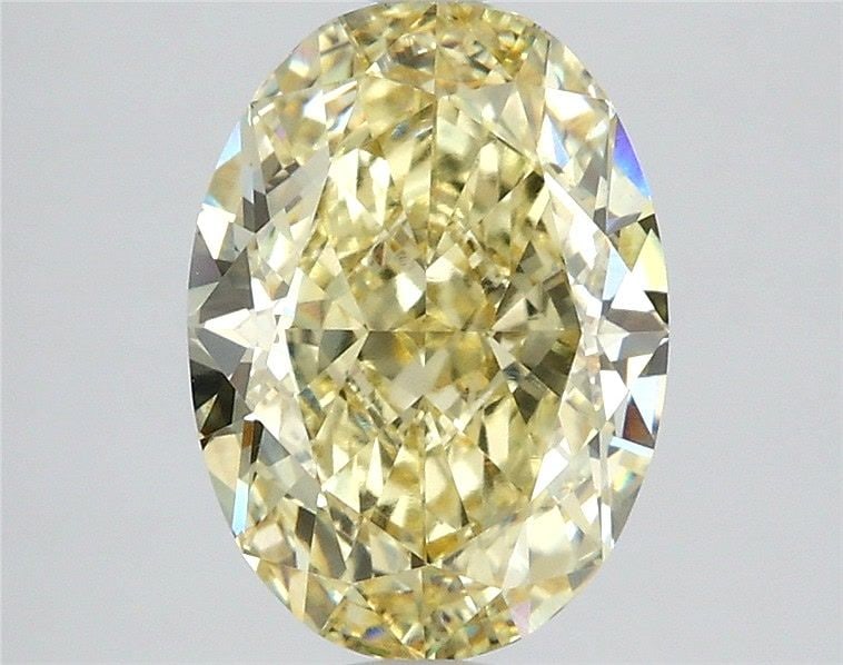 Loose Diamond - OVAL 3.08ct Fancy Yellow VVS2: Loose Diamond - OVAL 3.08ct Fancy Yellow VVS2 Source: This is a real non-mined Diamond that has been grown in a lab Shape: OVAL Carats: 3.08 Color: Fancy Yellow Certification: IGI Video: