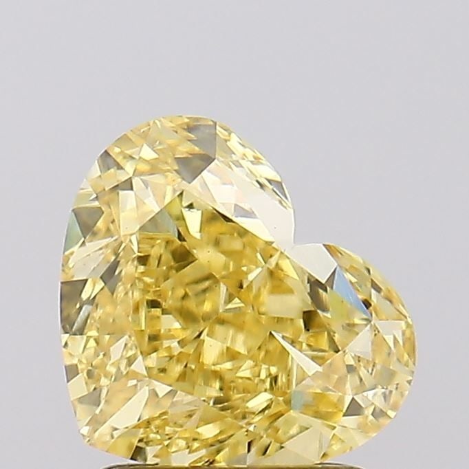 Loose Diamond - HEART 2.01ct Fancy Vivid Yellow VS1: Loose Diamond - HEART 2.01ct Fancy Vivid Yellow VS1 Source: This is a real non-mined Diamond that has been grown in a lab Shape: HEART Carats: 2.01 Color: Fancy Vivid Yellow Certification: IGI Video: