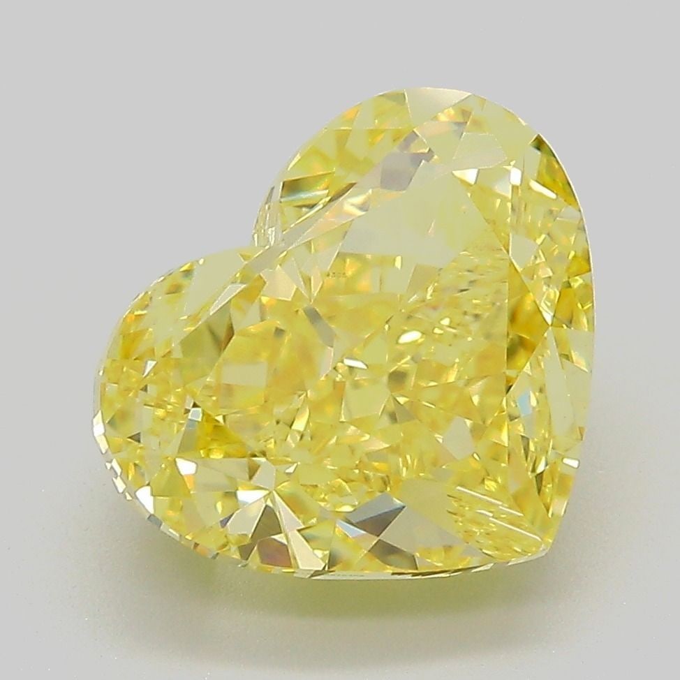 Loose Diamond - HEART 5.21ct Fancy Vivid Yellow VVS2: Loose Diamond - HEART 5.21ct Fancy Vivid Yellow VVS2 Source: This is a real non-mined Diamond that has been grown in a lab Shape: HEART Carats: 5.21 Color: Fancy Vivid Yellow Certification: IGI Video:
