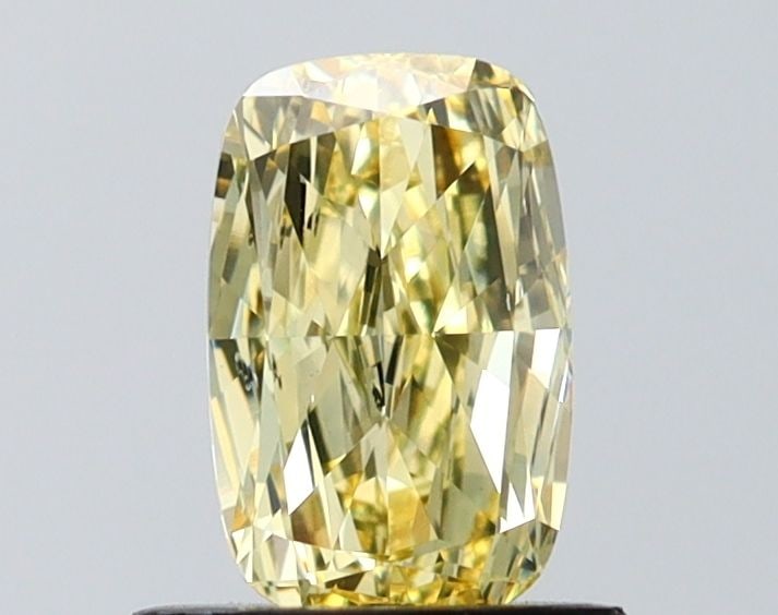 Loose Diamond - CUSHION MODIFIED 1.0ct Fancy Yellow VS2: Loose Diamond - CUSHION MODIFIED 1.0ct Fancy Yellow VS2 Source: This is a real non-mined Diamond that has been grown in a lab Shape: CUSHION MODIFIED Carats: 1.0 Color: Fancy Yellow Certification: IGI