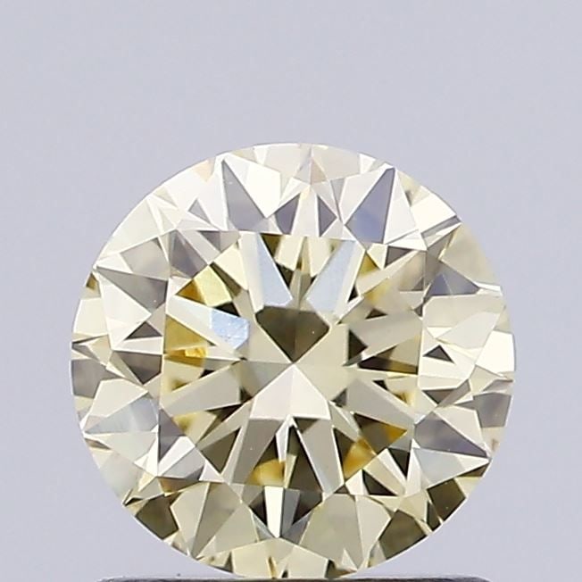 Loose Diamond - ROUND 0.91ct Fancy Light Yellow VS1: Loose Diamond - ROUND 0.91ct Fancy Light Yellow VS1 Source: This is a real non-mined Diamond that has been grown in a lab Shape: ROUND Carats: 0.91 Color: Fancy Light Yellow Certification: IGI Video: