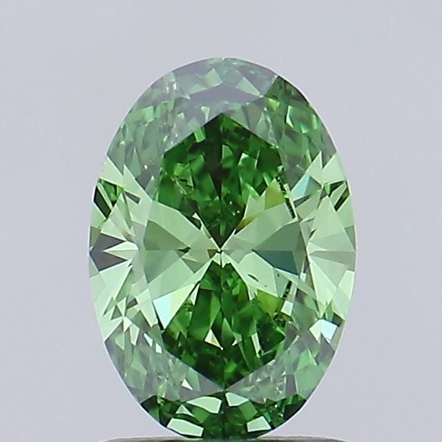Loose Diamond - OVAL 0.95ct Fancy Vivid Green VS1: Loose Diamond - OVAL 0.95ct Fancy Vivid Green VS1 Source: This is a real non-mined Diamond that has been grown in a lab Shape: OVAL Carats: 0.95 Color: Fancy Vivid Green Certification: IGI Video: