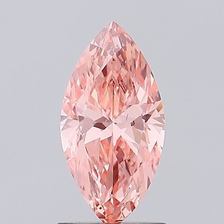 Loose Diamond - MARQUISE 1.07ct Fancy Vivid Pink VS2: Loose Diamond - MARQUISE 1.07ct Fancy Vivid Pink VS2 Source: This is a real non-mined Diamond that has been grown in a lab Shape: MARQUISE Carats: 1.07 Color: Fancy Vivid Pink Certification: IGI Video