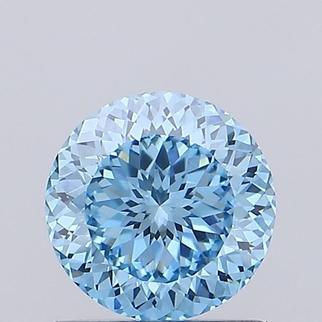 Loose Diamond - ROUND 1.1ct Fancy Vivid Blue VVS2: Loose Diamond - ROUND 1.1ct Fancy Vivid Blue VVS2 Source: This is a real non-mined Diamond that has been grown in a lab Shape: ROUND Carats: 1.1 Color: Fancy Vivid Blue Certification: IGI Video: