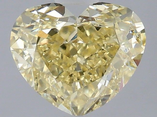 Loose Diamond - HEART 2.04ct Fancy Yellow VS1: Loose Diamond - HEART 2.04ct Fancy Yellow VS1 Source: This is a real non-mined Diamond that has been grown in a lab Shape: HEART Carats: 2.04 Color: Fancy Yellow Certification: IGI Video: Video Link