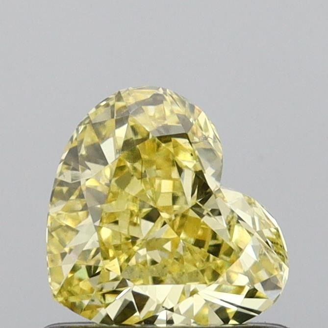 Loose Diamond - HEART 0.71ct Fancy Intense Yellow VS2: Loose Diamond - HEART 0.71ct Fancy Intense Yellow VS2 Source: This is a real non-mined Diamond that has been grown in a lab Shape: HEART Carats: 0.71 Color: Fancy Intense Yellow Certification: IGI Vid