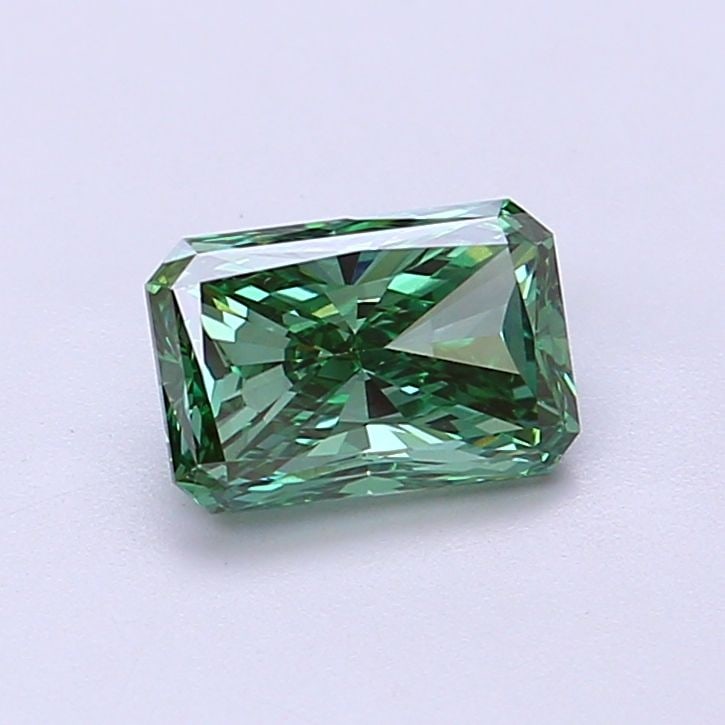 Loose Diamond - RADIANT 0.9ct Fancy Vivid Green VS1: Loose Diamond - RADIANT 0.9ct Fancy Vivid Green VS1 Source: This is a real non-mined Diamond that has been grown in a lab Shape: RADIANT Carats: 0.9 Color: Fancy Vivid Green Certification: IGI Video: