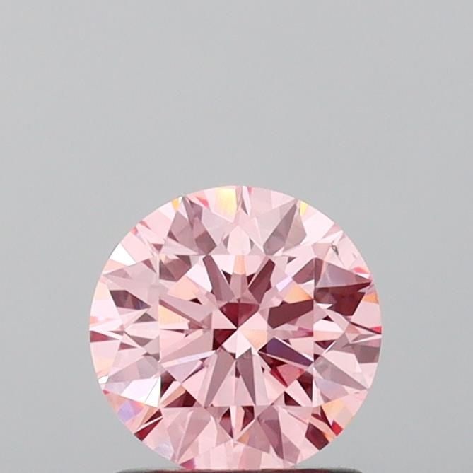 Ideal Loose Diamond - ROUND 1.16ct Fancy Vivid Pink VS2: Ideal Loose Diamond - ROUND 1.16ct Fancy Vivid Pink VS2 Source: This is a real non-mined Diamond that has been grown in a lab Shape: ROUND Carats: 1.16 Color: Fancy Vivid Pink Certification: IGI Video