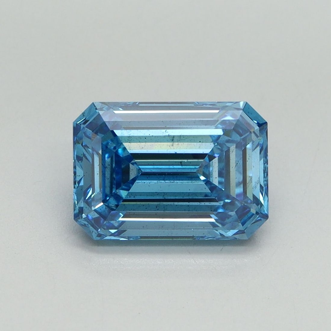 Loose Diamond - EMERALD 2.05ct Fancy Vivid Blue SI1: Loose Diamond - EMERALD 2.05ct Fancy Vivid Blue SI1 Source: This is a real non-mined Diamond that has been grown in a lab Shape: EMERALD Carats: 2.05 Color: Fancy Vivid Blue Certification: IGI Video: