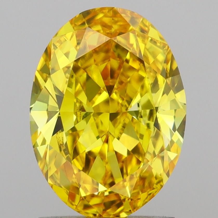 Loose Diamond - OVAL 2.04ct Fancy Vivid Yellow VVS2: Loose Diamond - OVAL 2.04ct Fancy Vivid Yellow VVS2 Source: This is a real non-mined Diamond that has been grown in a lab Shape: OVAL Carats: 2.04 Color: Fancy Vivid Yellow Certification: IGI Video: