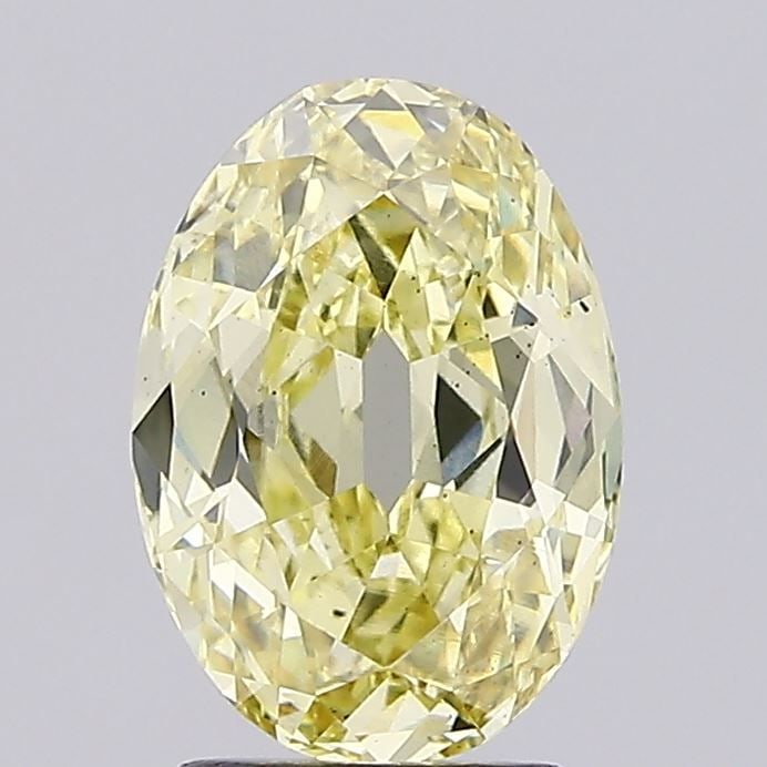 Loose Diamond - OVAL 2.91ct Fancy Light Yellow VS2: Loose Diamond - OVAL 2.91ct Fancy Light Yellow VS2 Source: This is a real non-mined Diamond that has been grown in a lab Shape: OVAL Carats: 2.91 Color: Fancy Light Yellow Certification: IGI Video: