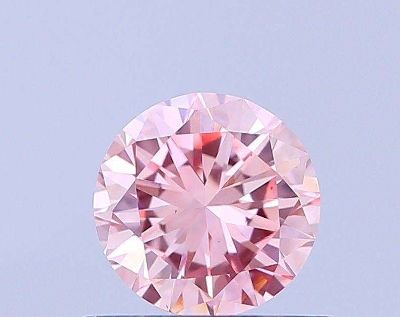 Loose Diamond - ROUND 0.58ct Fancy Vivid Pink VS2: Loose Diamond - ROUND 0.58ct Fancy Vivid Pink VS2 Source: This is a real non-mined Diamond that has been grown in a lab Shape: ROUND Carats: 0.58 Color: Fancy Vivid Pink Certification: IGI Video: