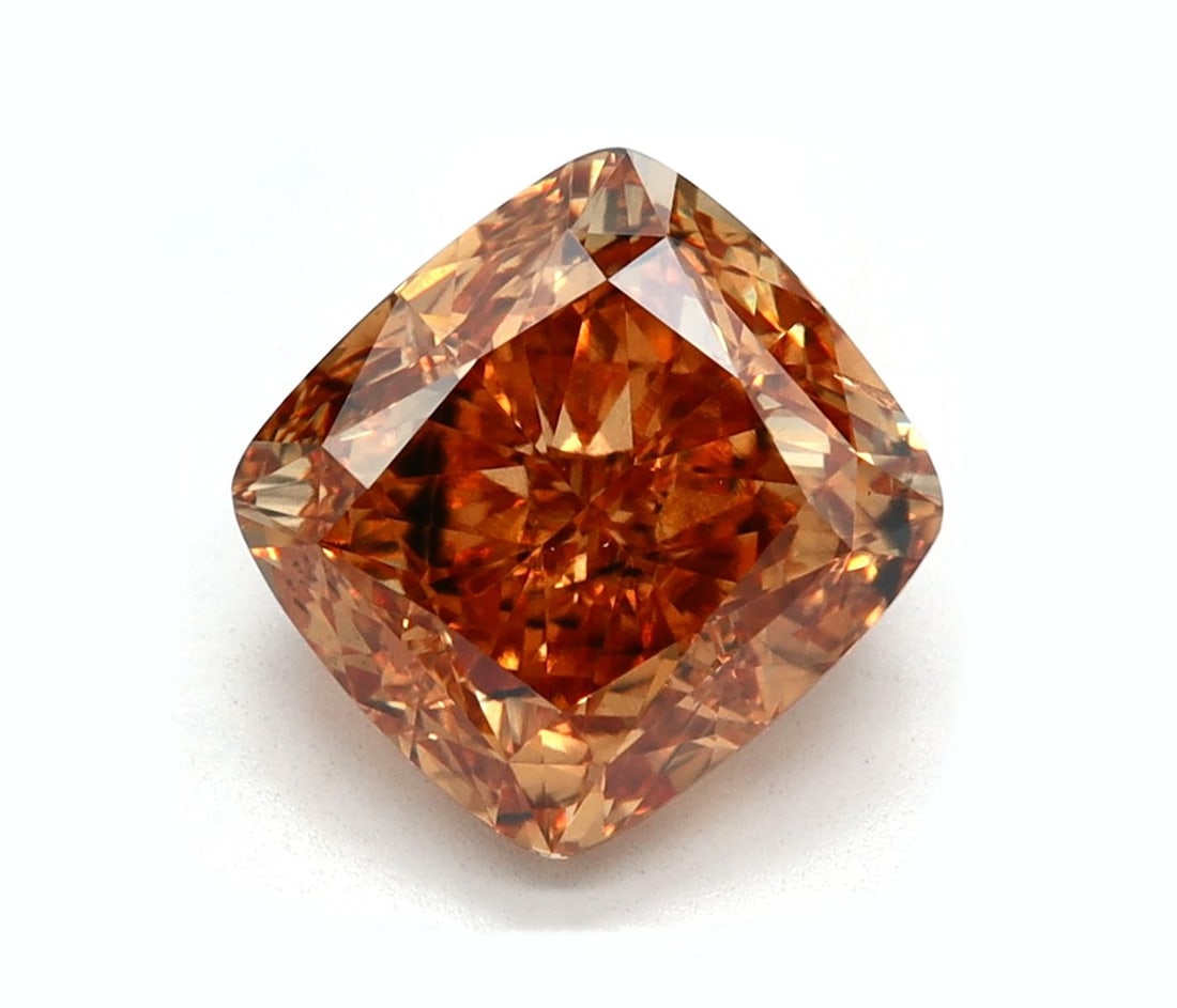 Loose Diamond - CUSHION MODIFIED 1.43ct Fancy Intense Brownish Yellow SI2: Loose Diamond - CUSHION MODIFIED 1.43ct Fancy Intense Brownish Yellow SI2 Source: This is a real non-mined Diamond that has been grown in a lab Shape: CUSHION MODIFIED Carats: 1.43 Color: Fancy Intens