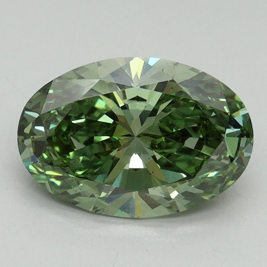 Loose Diamond - OVAL 2.18ct Fancy Vivid Green VS2: Loose Diamond - OVAL 2.18ct Fancy Vivid Green VS2 Source: This is a real non-mined Diamond that has been grown in a lab Shape: OVAL Carats: 2.18 Color: Fancy Vivid Green Certification: IGI Video: