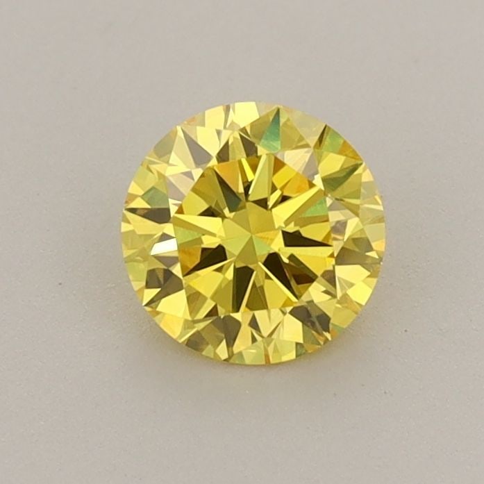 Loose Diamond - ROUND 0.63ct Fancy Vivid Yellow VVS2: Loose Diamond - ROUND 0.63ct Fancy Vivid Yellow VVS2 Source: This is a real non-mined Diamond that has been grown in a lab Shape: ROUND Carats: 0.63 Color: Fancy Vivid Yellow Certification: IGI Video: