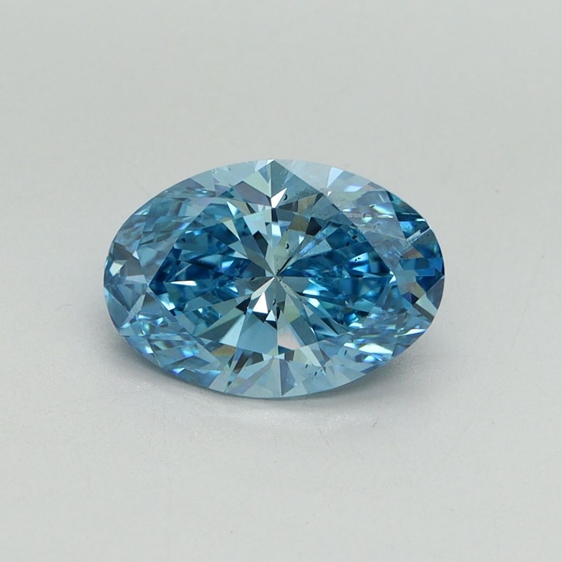 Loose Diamond - OVAL 1.5ct Fancy Vivid Blue SI1: Loose Diamond - OVAL 1.5ct Fancy Vivid Blue SI1 Source: This is a real non-mined Diamond that has been grown in a lab Shape: OVAL Carats: 1.5 Color: Fancy Vivid Blue Certification: IGI Video: