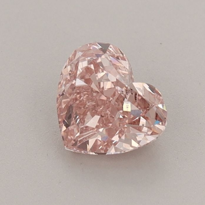 Loose Diamond - HEART 0.71ct Fancy Intense Pink VVS2: Loose Diamond - HEART 0.71ct Fancy Intense Pink VVS2 Source: This is a real non-mined Diamond that has been grown in a lab Shape: HEART Carats: 0.71 Color: Fancy Intense Pink Certification: IGI Video: