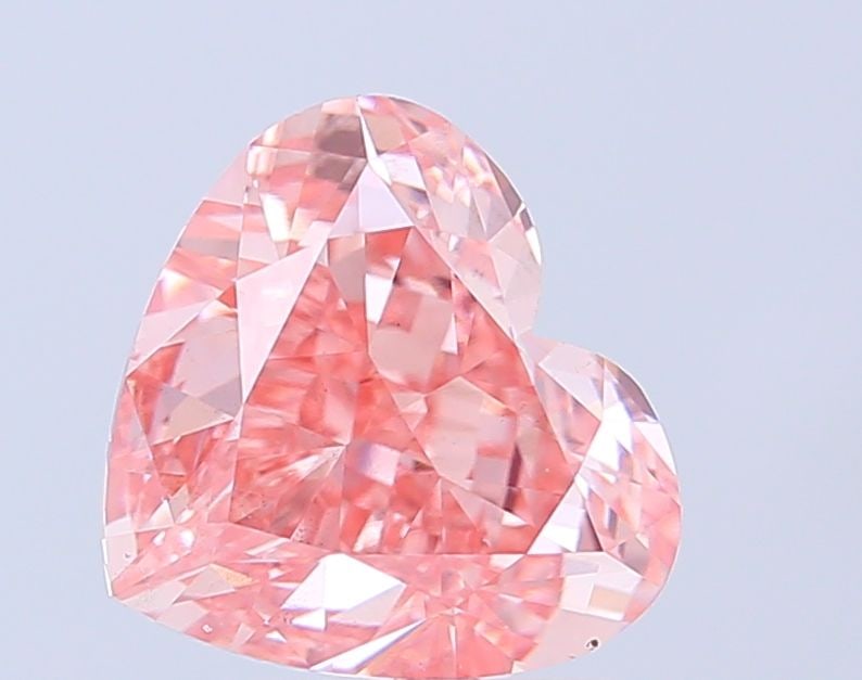 Loose Diamond - HEART 4.06ct Fancy Vivid Pink VS2: Loose Diamond - HEART 4.06ct Fancy Vivid Pink VS2 Source: This is a real non-mined Diamond that has been grown in a lab Shape: HEART Carats: 4.06 Color: Fancy Vivid Pink Certification: IGI Video: