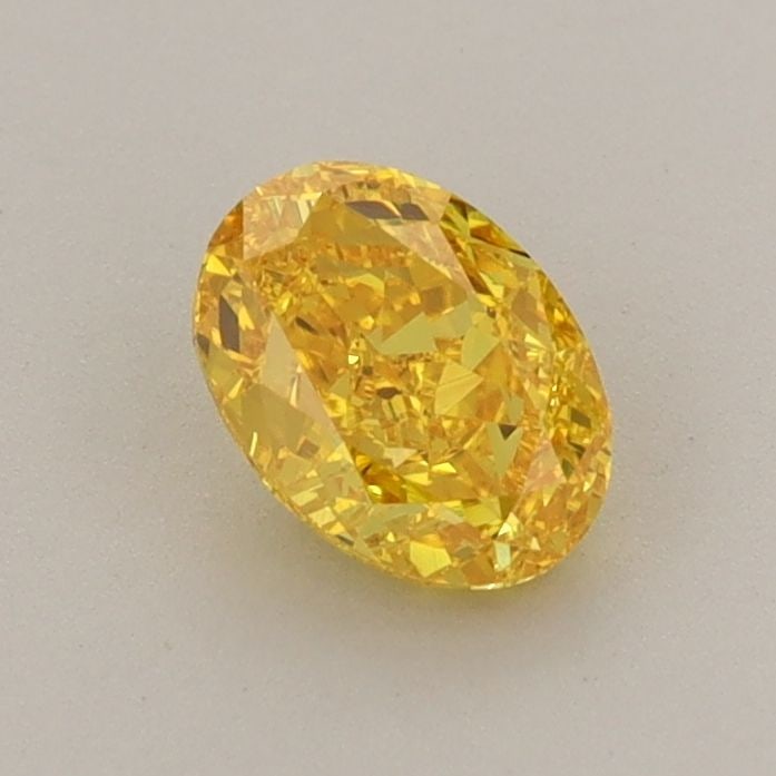 Loose Diamond - OVAL 0.71ct Fancy Vivid Yellow VVS2: Loose Diamond - OVAL 0.71ct Fancy Vivid Yellow VVS2 Source: This is a real non-mined Diamond that has been grown in a lab Shape: OVAL Carats: 0.71 Color: Fancy Vivid Yellow Certification: IGI Video: