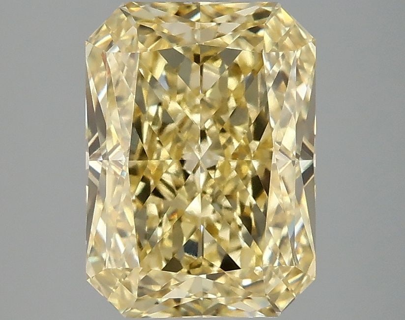 Loose Diamond - RADIANT 3.08ct Fancy Vivid Yellow VS1: Loose Diamond - RADIANT 3.08ct Fancy Vivid Yellow VS1 Source: This is a real non-mined Diamond that has been grown in a lab Shape: RADIANT Carats: 3.08 Color: Fancy Vivid Yellow Certification: IGI Vid
