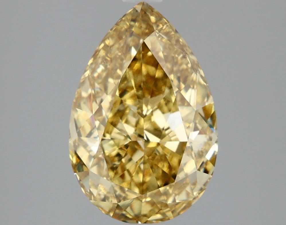 Loose Diamond - PEAR 3.03ct Fancy Vivid Yellow VS1: Loose Diamond - PEAR 3.03ct Fancy Vivid Yellow VS1 Source: This is a real non-mined Diamond that has been grown in a lab Shape: PEAR Carats: 3.03 Color: Fancy Vivid Yellow Certification: IGI Video: