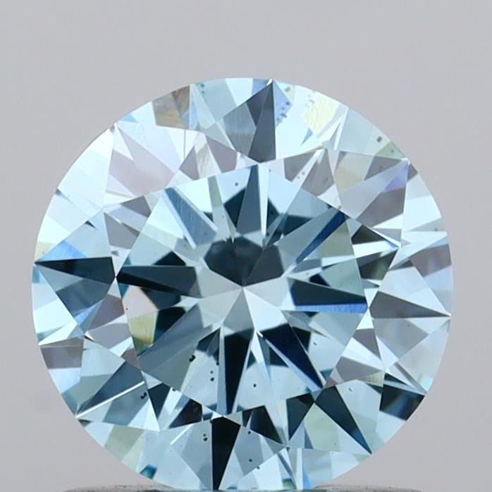 Loose Diamond - ROUND 0.92ct Fancy Vivid Blue VS2: Loose Diamond - ROUND 0.92ct Fancy Vivid Blue VS2 Source: This is a real non-mined Diamond that has been grown in a lab Shape: ROUND Carats: 0.92 Color: Fancy Vivid Blue Certification: IGI Video: