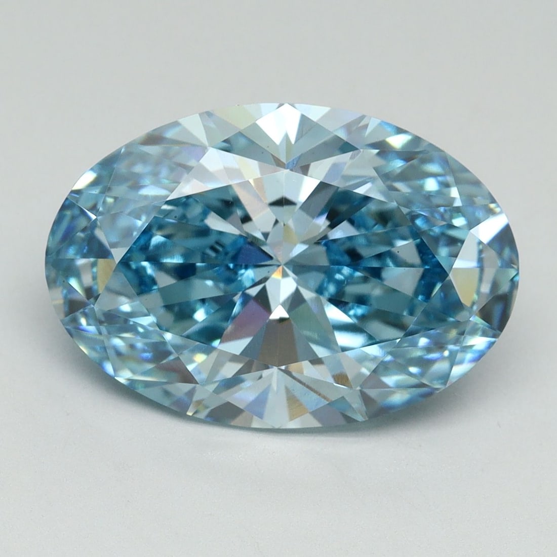 Loose Diamond - OVAL 6.38ct Fancy Vivid Blue VS1: Loose Diamond - OVAL 6.38ct Fancy Vivid Blue VS1 Source: This is a real non-mined Diamond that has been grown in a lab Shape: OVAL Carats: 6.38 Color: Fancy Vivid Blue Certification: IGI Video: