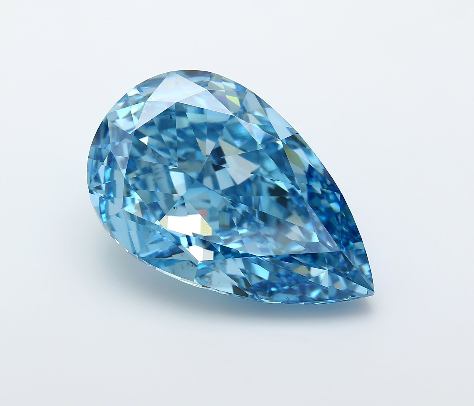 Loose Diamond - PEAR 27.07ct Fancy Vivid Blue VS2: Loose Diamond - PEAR 27.07ct Fancy Vivid Blue VS2 Source: This is a real non-mined Diamond that has been grown in a lab Shape: PEAR Carats: 27.07 Color: Fancy Vivid Blue Certification: IGI Video: